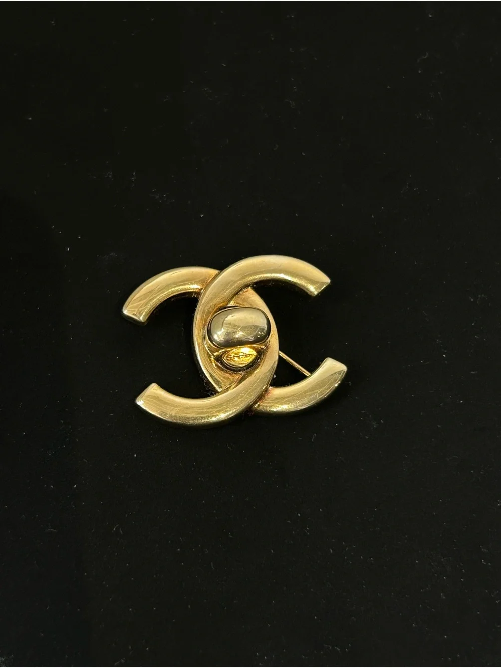 Chanel gold brooch